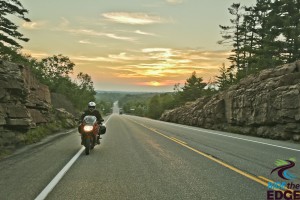 motorcycle riding at sunset in Explorers' Edge