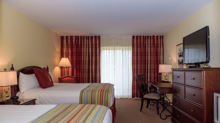 hotel room room with two queen beds